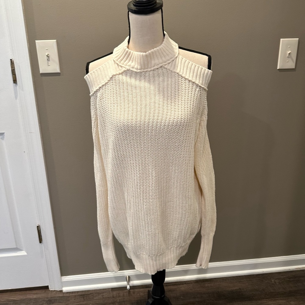 Free People cold shoulder knit cream sweater. Worn only two times.